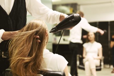 Stylist Drying Girl's Hair With babylights andHair Dryer In Beauty Salon Viviscal Blog